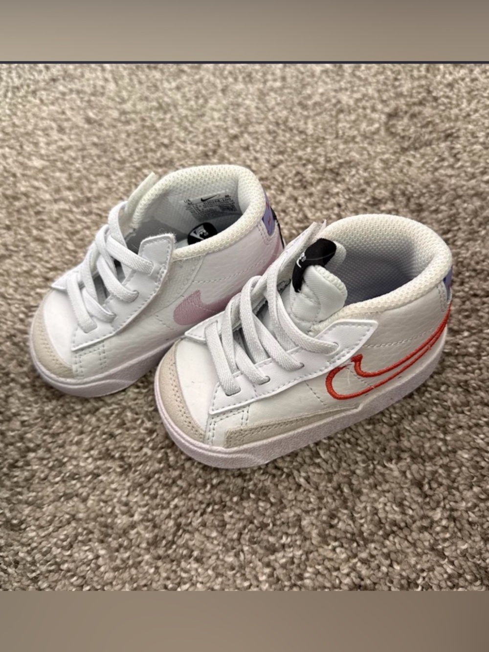 Nike Kids White Sneakers with Pink and Coral Swooshes